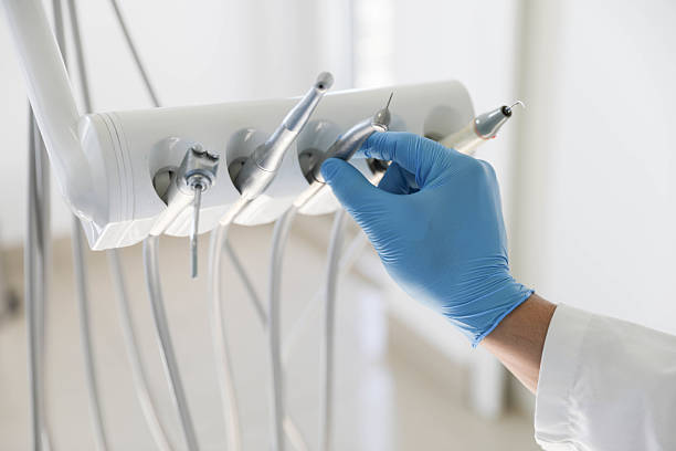 Professional Dental Implants technician working in Gibraltar, MI
